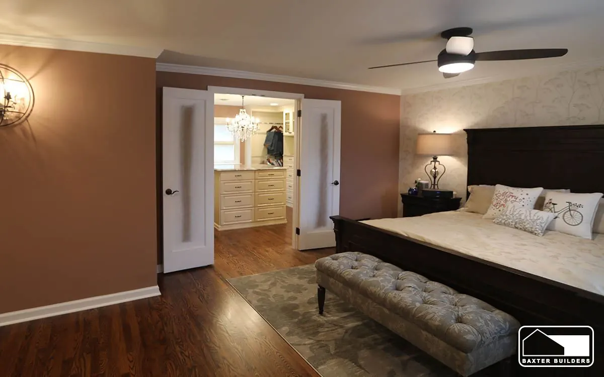 Primary bedroom in a new addition with hardwood floors