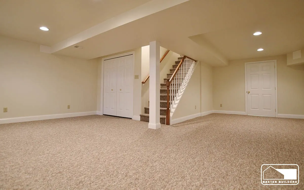 Bright finished basement with carpet, recessed lights and new stairs