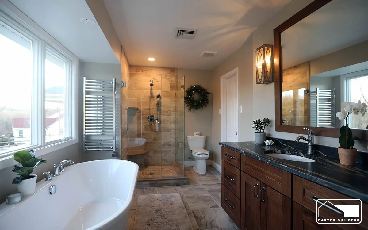 Primary bathroom with freestanding tub, tiled walk-in shower and dark wood vanity